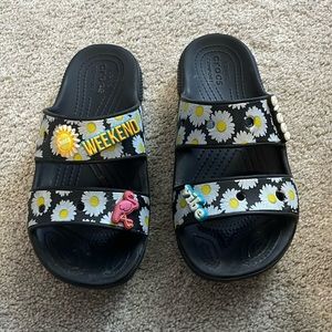 Used slip on Crocs - women size 6 - comes with jibbits.